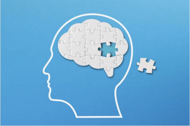Illustration of a brain with a missing puzzle piece showing the connection between gum disease, sleep apnea, and Alzheimer’s risk in Reno, NV